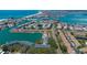 Scenic aerial view of waterfront community with boat access and beautiful ocean views at 12140 Capri S Cir, Treasure Island, FL 33706