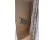 Bathroom featuring a tub with shower, towel bar, and flower details at 126 Philadelphia Blvd # 10, Palm Harbor, FL 34684