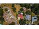 Aerial view of a neighborhood featuring single Gathering homes, mature trees, and private swimming pools at 130 Woodcutter Ln, Palm Harbor, FL 34683