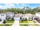 Beautiful single Gathering home with gray paint, landscaping and a two car garage at 13061 Brookside Moss Dr, Riverview, FL 33579