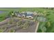 Overhead rendering of community clubhouse, pool, tennis courts, playground, and parking at 13631 Sunlight Meadow Dr, Riverview, FL 33578