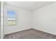 Well-lit bedroom with gray carpet and a window at 13631 Sunlight Meadow Dr, Riverview, FL 33578