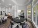 Breakfast nook next to gourmet kitchen with custom cabinets and stainless steel appliances at 13805 Carryback Dr, Dade City, FL 33525