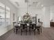 Elegant dining room with decorative chandelier and stylish decor at 13805 Carryback Dr, Dade City, FL 33525