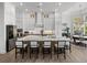 Gourmet kitchen features a large island, sleek stainless steel appliances, and ample cabinet space at 13805 Carryback Dr, Dade City, FL 33525