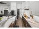 Spacious modern kitchen with stainless steel appliances, island and custom cabinetry at 13805 Carryback Dr, Dade City, FL 33525