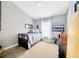 Bedroom featuring neutral walls and decor and a window providing natural light at 14417 Barley Field Dr, Wimauma, FL 33598