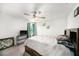 A comfortable bedroom with a ceiling fan and bright natural light from a window at 18161 Hunters Meadow Walk, Land O Lakes, FL 34638
