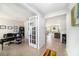 Inviting entryway leading to a spacious office and a comfortable living area at 18161 Hunters Meadow Walk, Land O Lakes, FL 34638
