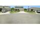 Inviting two-story home with a two-car garage and a well-kept lawn in a serene neighborhood at 18161 Hunters Meadow Walk, Land O Lakes, FL 34638