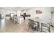 Bright, modern kitchen with white cabinets, granite countertops and stainless steel appliances at 18161 Hunters Meadow Walk, Land O Lakes, FL 34638