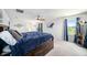 Comfortable main bedroom with large window and soft natural light at 18161 Hunters Meadow Walk, Land O Lakes, FL 34638