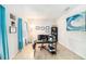 Bright home office with tile floors, ample workspace, and stylish decor at 18161 Hunters Meadow Walk, Land O Lakes, FL 34638