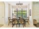Dining room featuring ample natural light, comfortable seating, and seamless access to adjacent spaces at 20347 Chestnut Grove Dr, Tampa, FL 33647