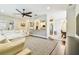 Living room showcasing seamless access to dining area and kitchen, promoting an open and social atmosphere at 20347 Chestnut Grove Dr, Tampa, FL 33647