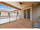 Spacious outdoor patio area with wooden floors and ceiling fan; French doors lead indoors at 20347 Chestnut Grove Dr, Tampa, FL 33647