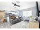 Open-concept living room connects to the kitchen, creating a bright and airy space perfect for gatherings at 206 Timberview Dr, Safety Harbor, FL 34695