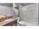 Well-maintained bathroom with granite countertops, shower with sliding door and vanity at 218 Pesaro Dr, North Venice, FL 34275