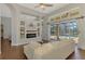 The living room features a fireplace and views to the lanai and pool area at 218 Pesaro Dr, North Venice, FL 34275