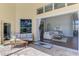 Covered patio offering an indoor-outdoor living space with views of the backyard at 218 Pesaro Dr, North Venice, FL 34275