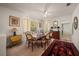 Traditional dining room featuring a wooden table, elegant chairs, and a decorative rug at 219 Park S Cir, Dunedin, FL 34698