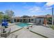 An aerial view of the backyard with a pool, patio, and fenced yard at 222 N Clearview Ave, Tampa, FL 33609