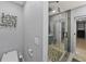 Modern bathroom with walk-in shower and toilet at 222 N Clearview Ave, Tampa, FL 33609