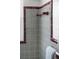 Vintage bathroom showing tiles and a chrome towel rack at 222 N Clearview Ave, Tampa, FL 33609