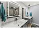 Beautiful bathroom with double sinks, LED mirrors, and modern fixtures at 222 N Clearview Ave, Tampa, FL 33609