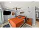Modern bedroom with gray walls, a ceiling fan, and wood accents at 222 N Clearview Ave, Tampa, FL 33609