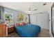 Comfortable bedroom with natural light, modern ceiling fan and closet at 222 N Clearview Ave, Tampa, FL 33609