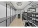 Large walk-in closet with custom shelving, storage solutions and good lighting at 222 N Clearview Ave, Tampa, FL 33609