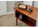 Vintage desk with retro telephone, polaroid camera, and vintage view finder at 222 N Clearview Ave, Tampa, FL 33609