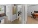 Hallway view with multiple rooms, including the living room and the study room at 222 N Clearview Ave, Tampa, FL 33609