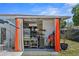 Inviting outdoor kitchen with a premium grill, ample counter space, and stylish privacy curtains at 222 N Clearview Ave, Tampa, FL 33609