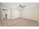 A bedroom with a closet and an ensuite bathroom at 2527 Silverback Ct, Palm Harbor, FL 34684