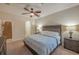 Bedroom with carpet, neutral walls and two night stands at 2527 Silverback Ct, Palm Harbor, FL 34684