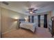 Cozy bedroom with a comfortable bed, soft lighting, and stylish window treatments at 2527 Silverback Ct, Palm Harbor, FL 34684