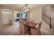 Bright dining room and living area with tile flooring at 2527 Silverback Ct, Palm Harbor, FL 34684
