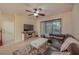 Living room features a sliding glass door leading to the outside at 2527 Silverback Ct, Palm Harbor, FL 34684