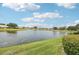 Backyard featuring a large pond at 2602 Novack Ct, Sun City Center, FL 33573
