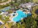 An aerial view of the community's large pool and clubhouse at 2602 Novack Ct, Sun City Center, FL 33573