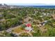 Scenic aerial view showcasing a charming home surrounded by mature trees and close to the waterfront at 300 22Nd S Ave, St Petersburg, FL 33705