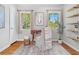 Cozy office space with natural light, hardwood floors, and a minimalist design for productivity at 300 22Nd S Ave, St Petersburg, FL 33705