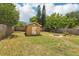 A lovely backyard shed and cozy fire pit in this well maintained, fully fenced yard at 3176 Duane Ave, Oldsmar, FL 34677