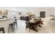 Bright dining area with a view of the living room and kitchen, perfect for entertaining at 3176 Duane Ave, Oldsmar, FL 34677