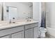 Clean, modern bathroom with double sinks, contemporary fixtures and shower/tub combo at 33091 Osprey Peak Way, San Antonio, FL 33576