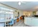 Kitchen with breakfast table, ample cabinet space, and easy access to the living area at 35128 Dale Ave, Zephyrhills, FL 33541