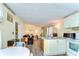 Bright living area with an open layout that flows into the kitchen and dining space at 35128 Dale Ave, Zephyrhills, FL 33541