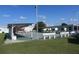 Zephyr Shores shuffleboard court with covered seating areas at 35128 Dale Ave, Zephyrhills, FL 33541